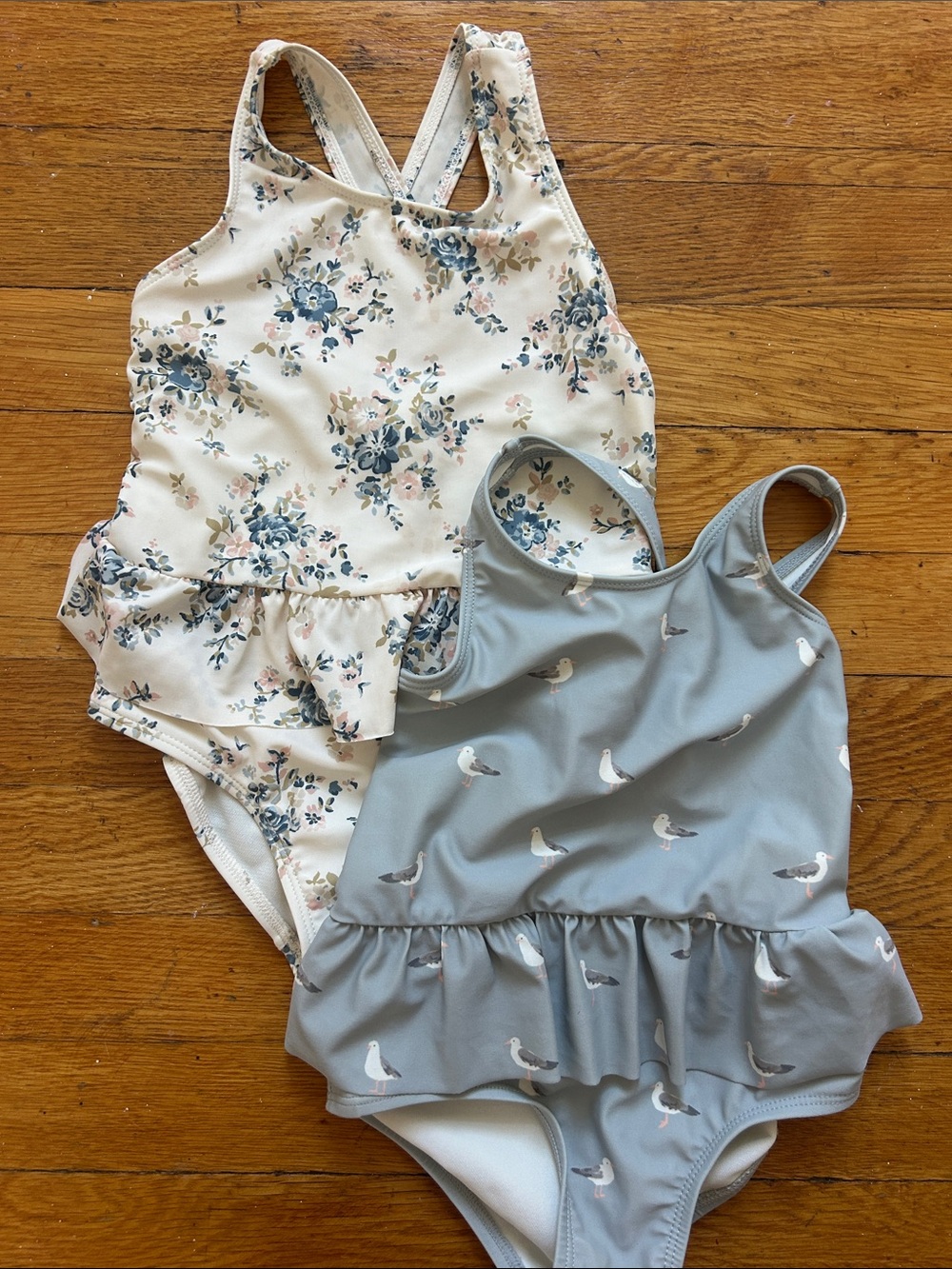 Two Little Planet swimsuits
